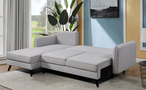 Sectional Sofa bed  in soft grey fabric.