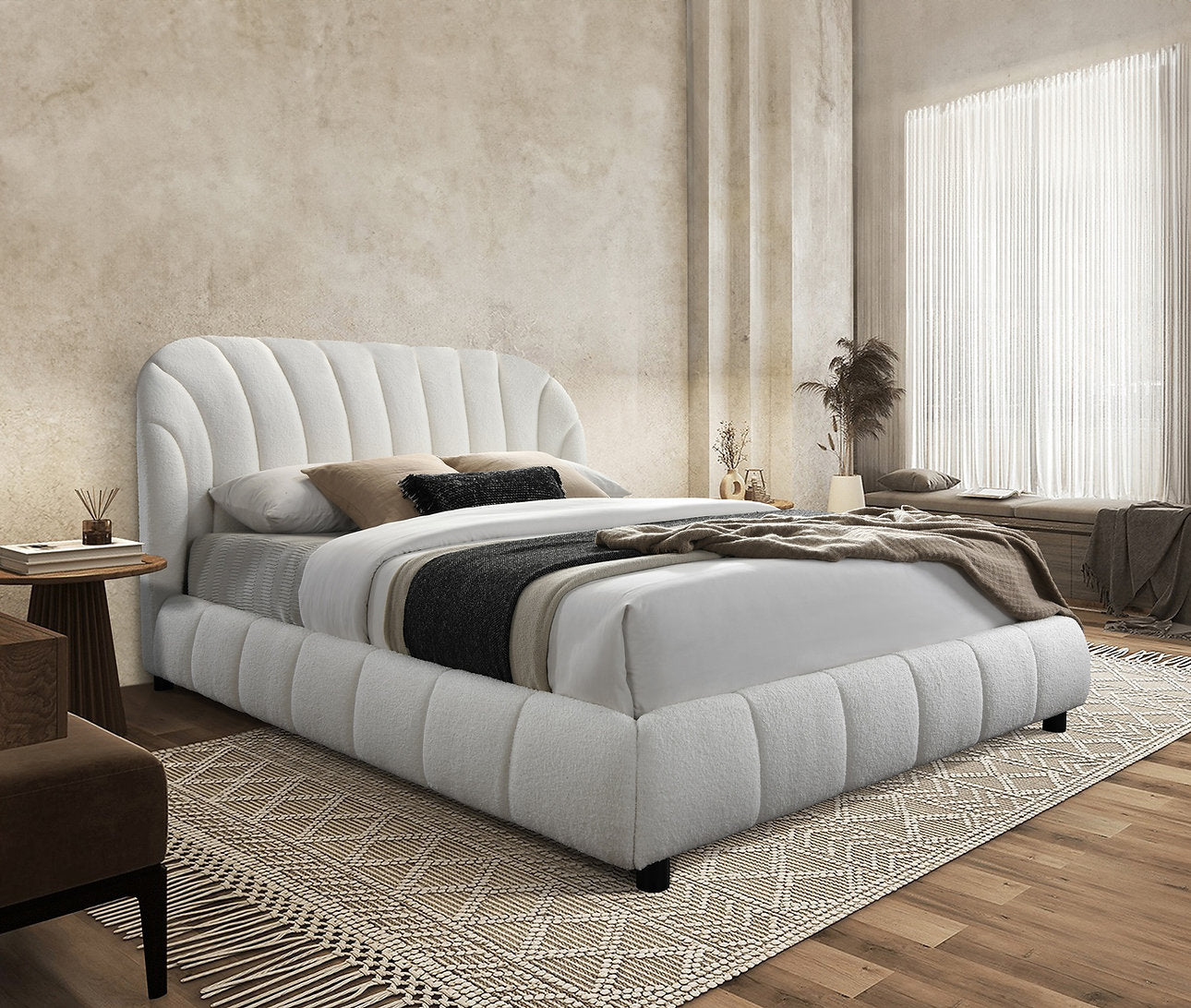 Platform bed with Elegant arched headboard in soft cream Boucle fabric.